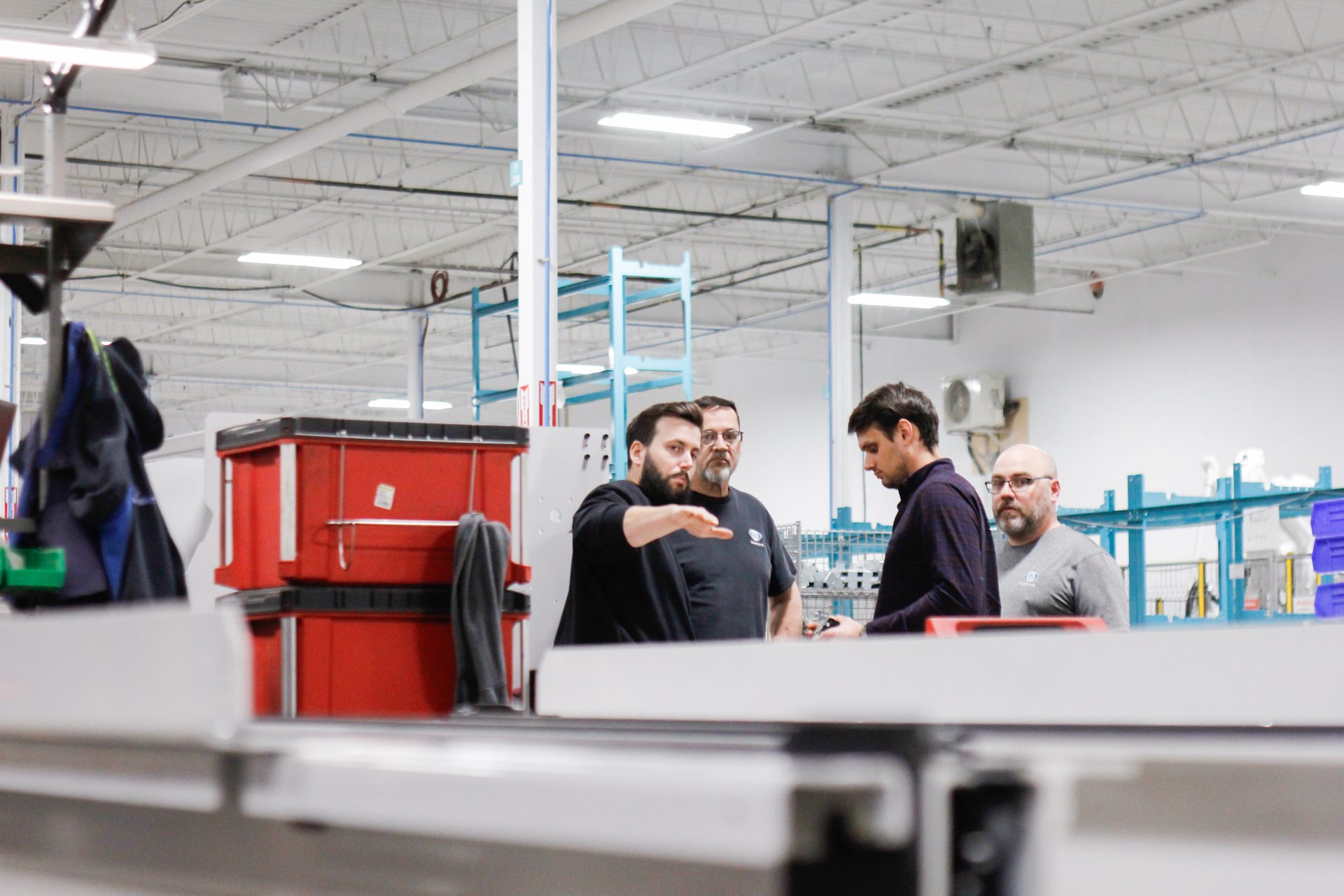 Numove employee explaining a project to clients