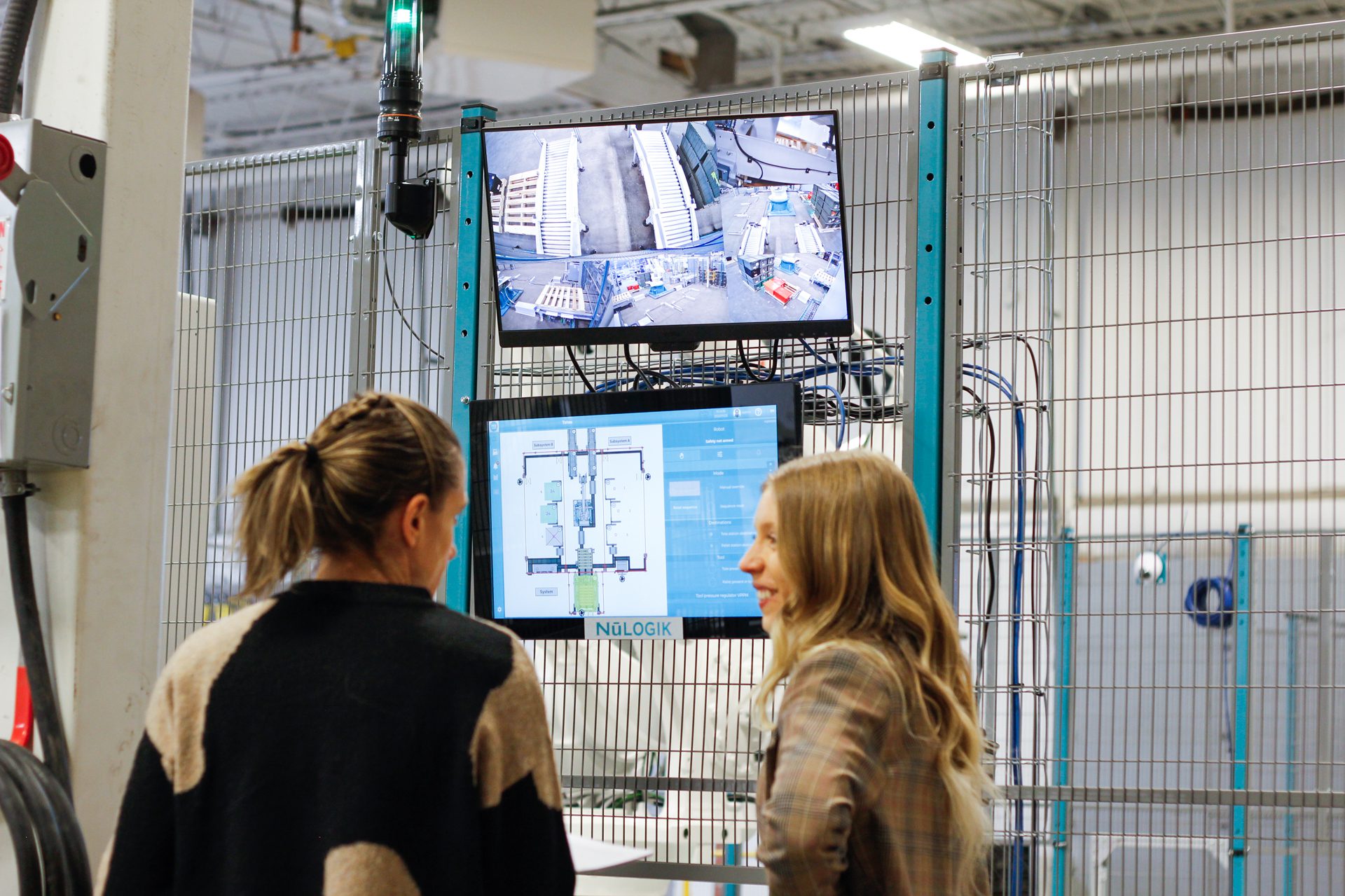 Employee in front of the NūLogik interface