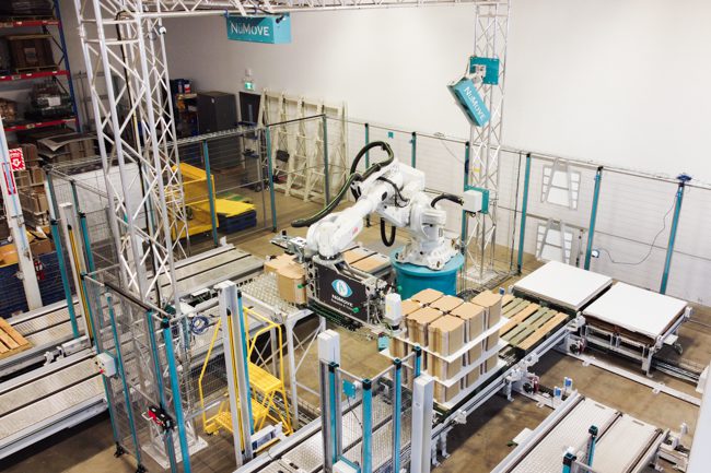 un système de dépalettisation et repalettisation de piles de carton plat intégré par numove en 2025